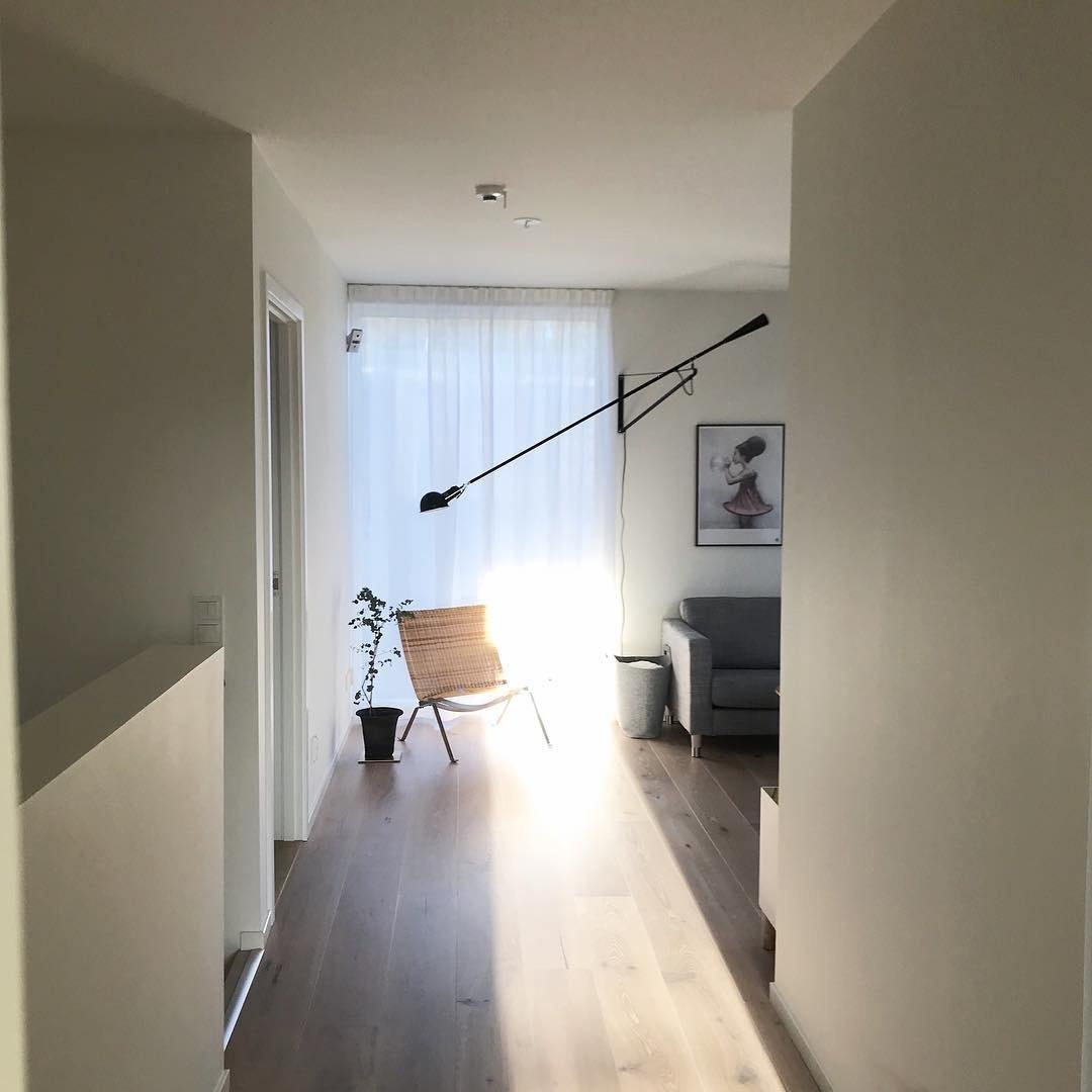 Adjustable Wall Lamp with Extended Arm and Rotating Shade, Cast Iron Counterweight
